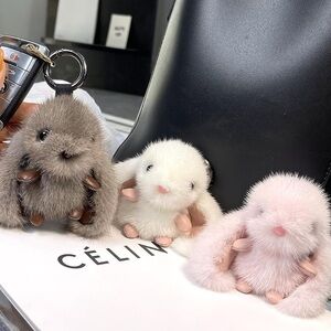 Cuddly Bunny Keychain/pull tags. Colors: brown, pink or white.